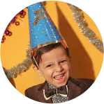 10 year old boy in party hat
